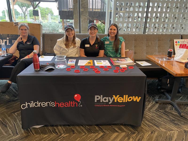 Informational booth about Play Yellow events supporting Children's Health